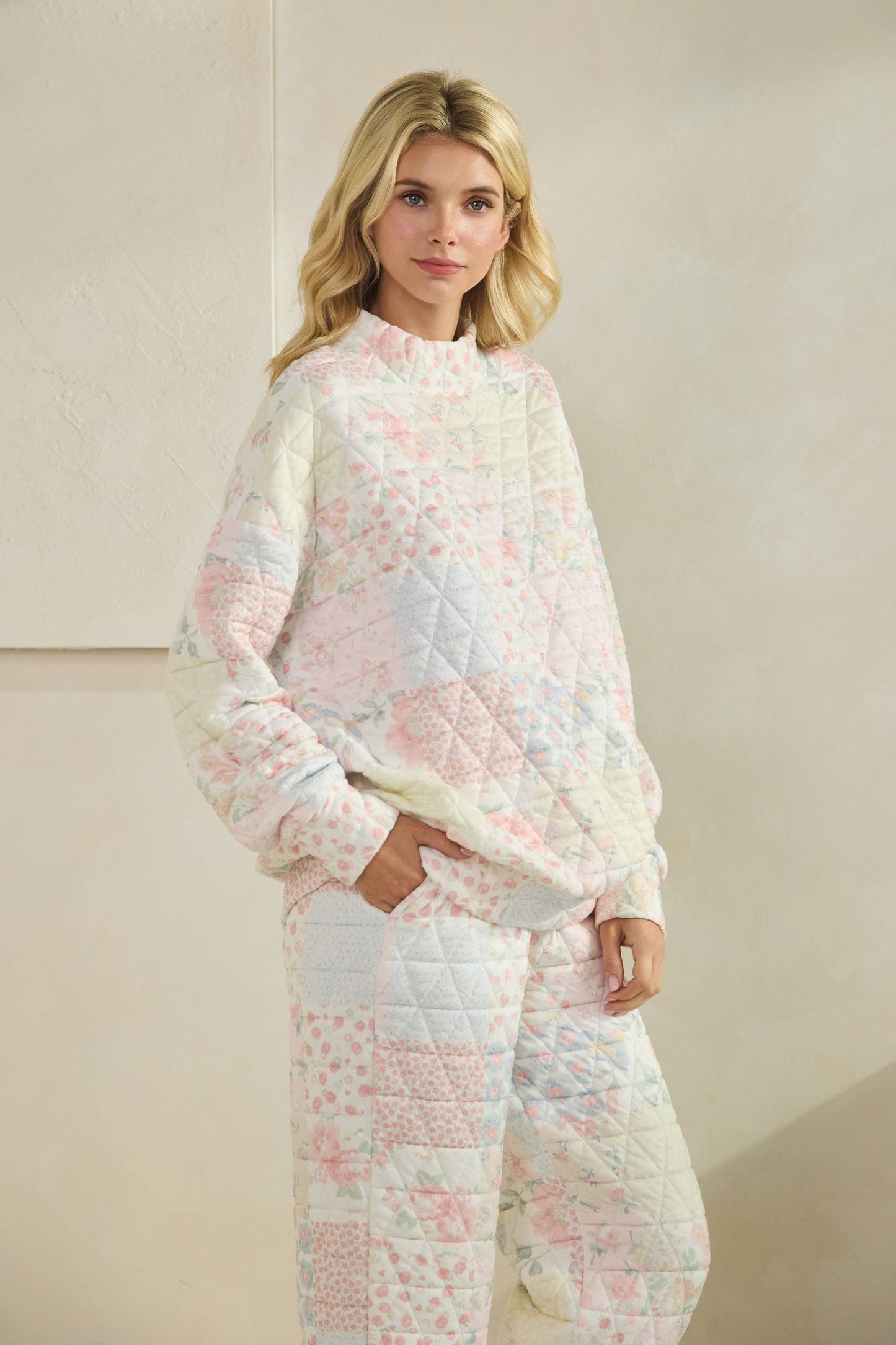 Floral textured mock neck sweater