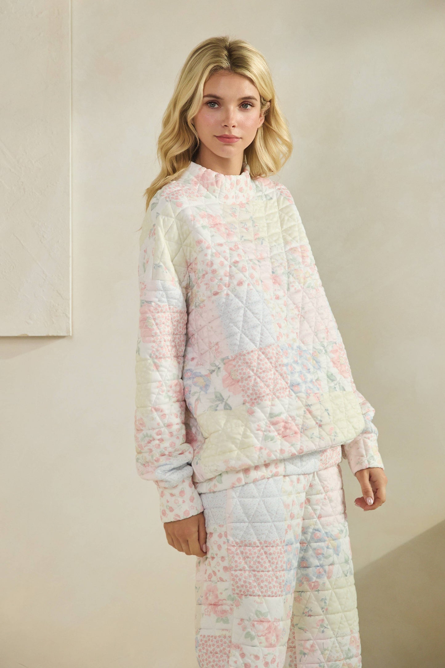 Floral textured mock neck sweater