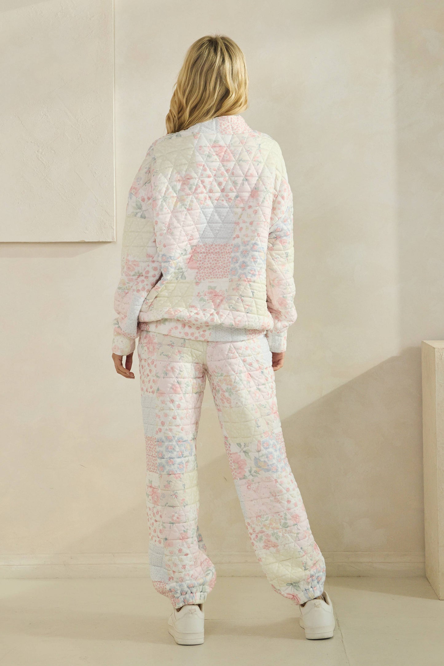 Floral textured mock neck sweater